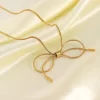 Bow Tie Necklace Show on a blanket