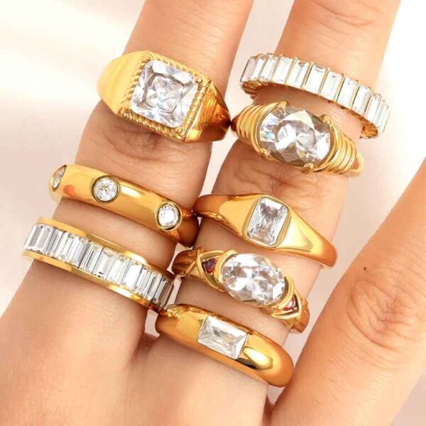 Various Clear Cubic Zircon Baguette Rings, gold color, shown on hand